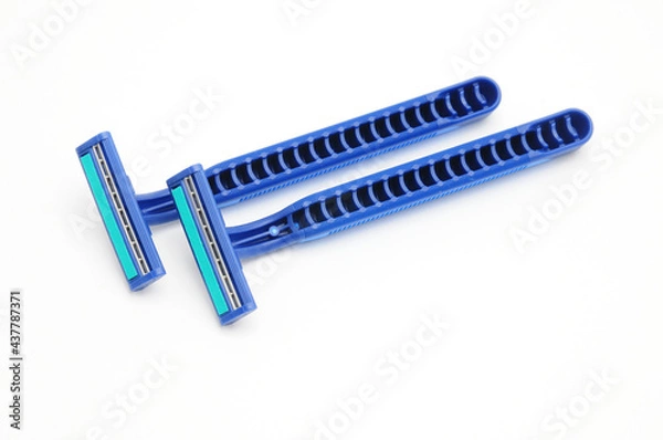 Fototapeta Disposable razor on a white background