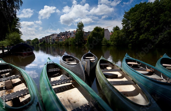 Fototapeta few canoe on river in Marburg