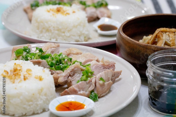 Fototapeta Handmade Hainanese chicken rice.Steam chicken with rice.