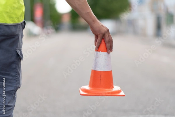 Fototapeta young technician at work marking work area