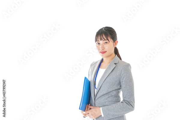 Fototapeta 書類を持つビジネスウーマン