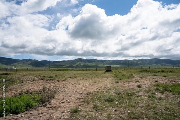 Fototapeta Clouds and mountains by Qinghai lake in summer