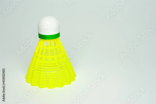 Fototapeta Badminton shuttlecock close-up is isolated on white
