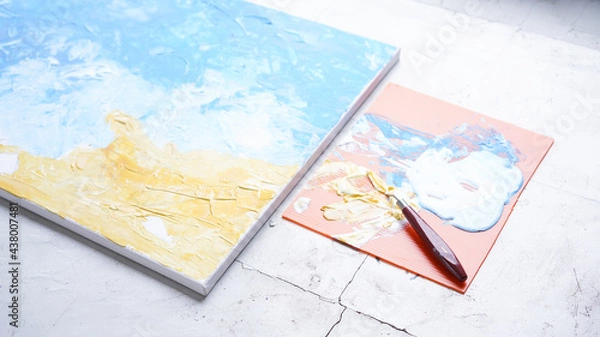 Fototapeta Ocean acrylic painting with palette knife on canvas with blue and turquoise. Golden sand on beach with trowel texture technic. Water splash art hand paint.  Summer and seascape feeling and tone.