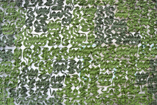 Fototapeta Military camouflage net, hunter net background.