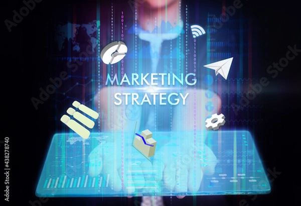 Fototapeta Business, Technology, Internet and network concept. Young businessman working on a virtual screen of the future and sees the inscription: Marketing strategy