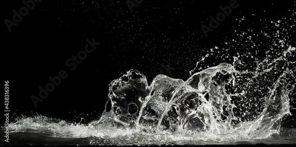 Obraz water splash on black background