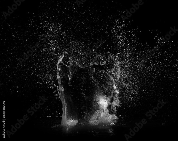 Obraz water splash on black background
