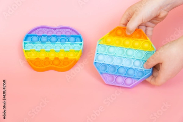 Obraz colorful silicone antistress sensory toy fidget push pop it