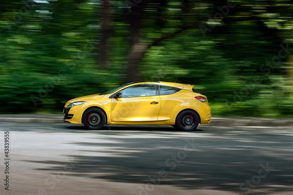 Obraz Yellow car moving