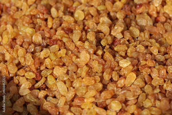 Obraz dried fruit background. raisins close up