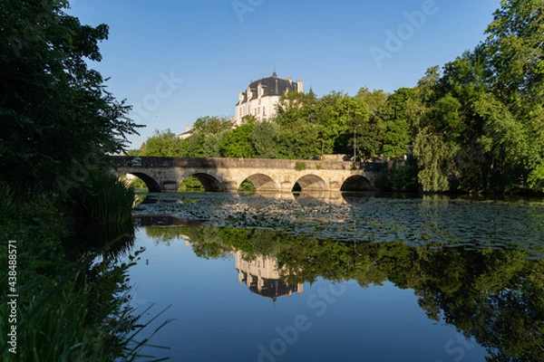 Fototapeta Castle Raoul and bridge with Reflection in Water, Chateauroux city, France