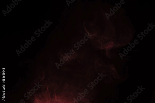 Fototapeta Yellow and pink steam on a black background.