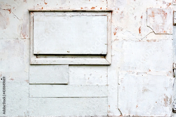 Fototapeta Part of old wooden village house. Wooden closed window with old white paint. Frame with empty space for your text or design.