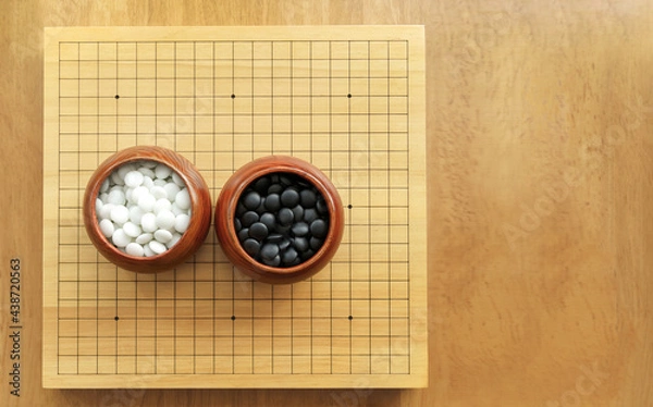 Obraz Goban, Baduk, Weiqi or Maklom - Traditional asian strategy board game. black and white stone of Chinese board game