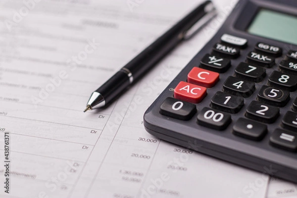 Fototapeta Black calculator on texture background stock image.