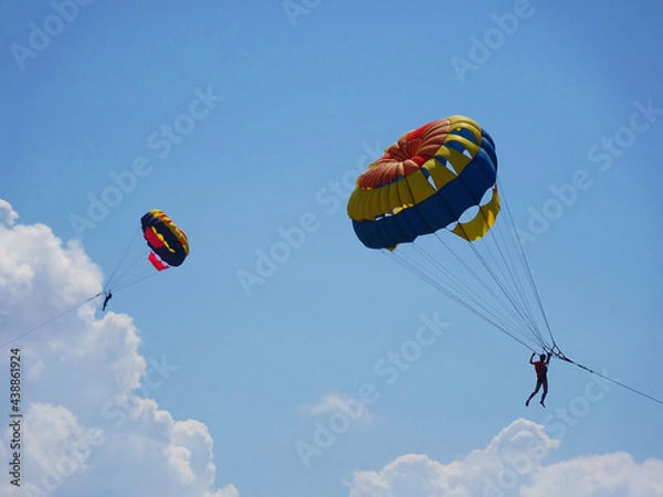 Obraz Parasailing into the sky