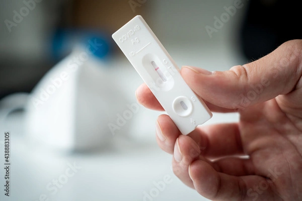 Fototapeta Holding corona negative self-test