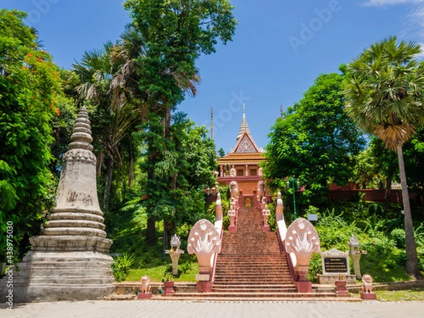 Fototapeta Stunning view of the main stairway with multi-headed snakes, leading to the Wat Phnom Pagoda, Phnom Penh, Cambodia
