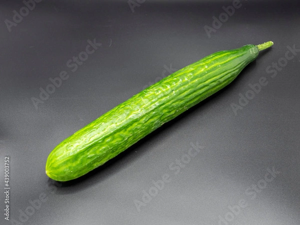 Obraz cucumber on a black background
