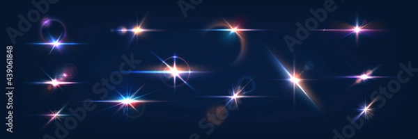Fototapeta Flash. Realistic flares. Glowing effects. Photography camera light or sunlight reflection from lens. Stars in space. Isolated glints set. Sparkle glares. Vector shimmering elements