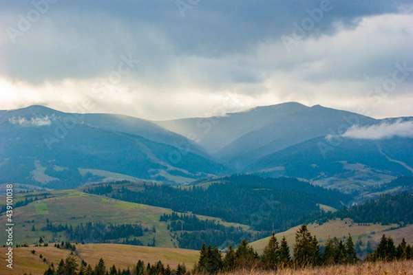 Fototapeta Sunrays touch the mountains