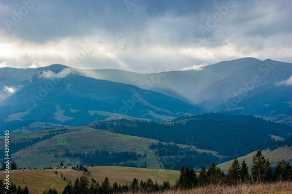 Fototapeta Sunrays touch the mountains