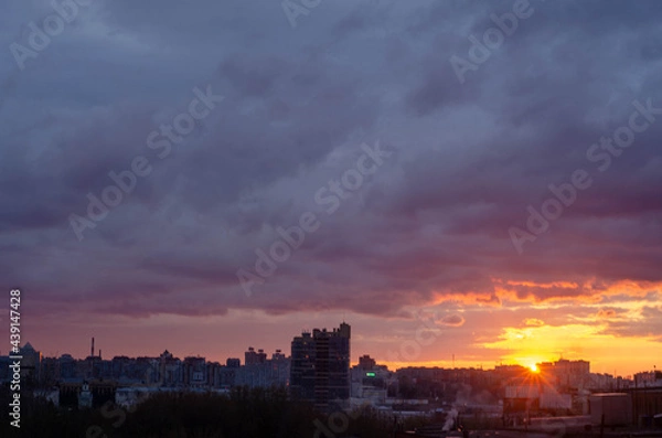 Fototapeta sunset over the city
