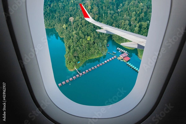 Obraz Plane window. Rajjaprabha Dam (Chiao Lan Dam), Surat Thani Province, Thailand mountain view, landscape outside window plane