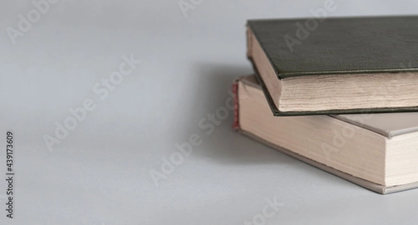 Obraz The book  on the table. Reading, literature, learning and back to school concept. Copy space.