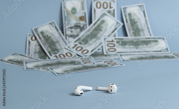 Obraz Dollars background, hundred USA dollar banknote bills, many American cash money, selective focus and  headphone