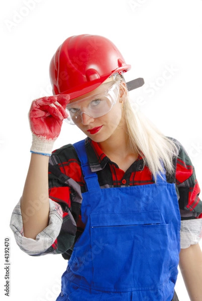 Obraz female construction worker in dungarees