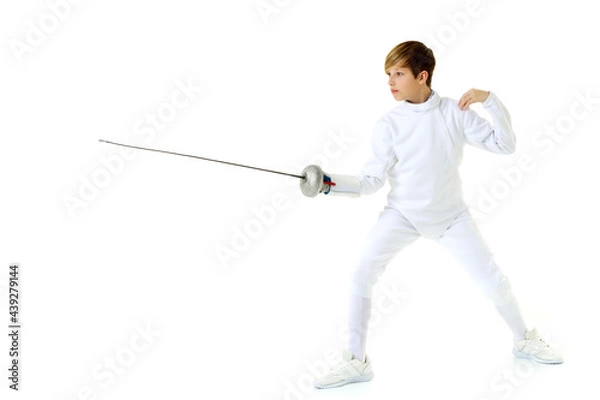 Fototapeta Fencer boy practicing effective technique