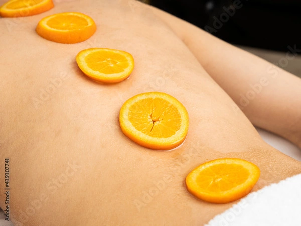 Obraz Spa treatment with slices of orange