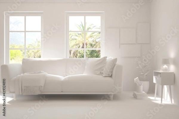 Fototapeta Mock up of stylish room in white color with sofa and green landscape in window. Scandinavian interior design. 3D illustration