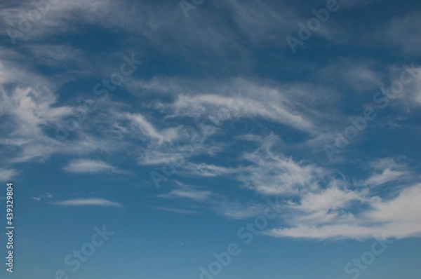 Obraz Beautiful blue sky background, white clouds covering thinly spread the sky