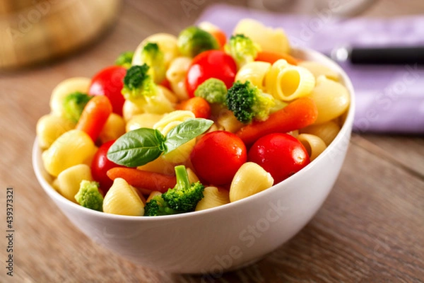 Obraz Fresh Pasta Salad with fresh vegetables. High quality photo