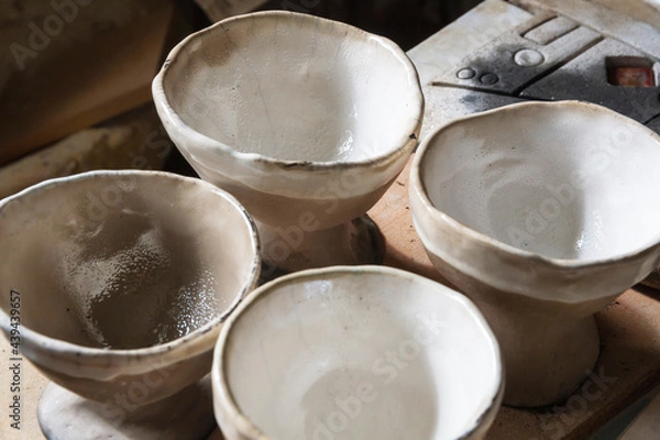 Fototapeta Cups or bowls artistic stoneware with the raku technique