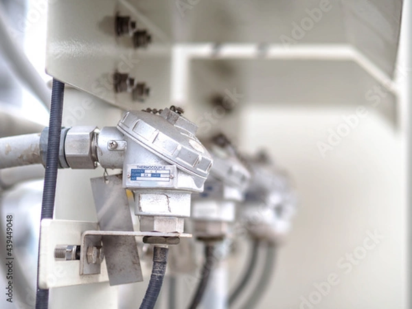 Fototapeta Temperature sensor for measuring instrument close up in industry zone at power plant.
