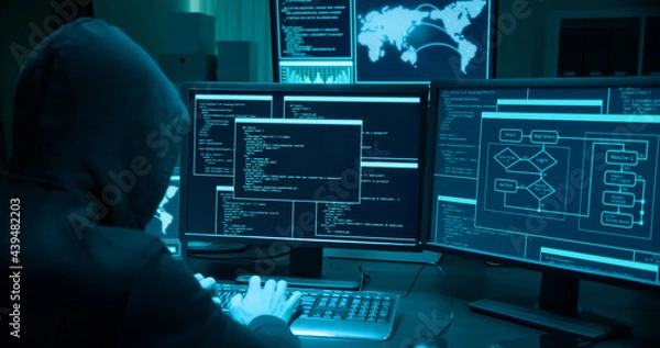 Obraz Azjatycki haker używają laptopa