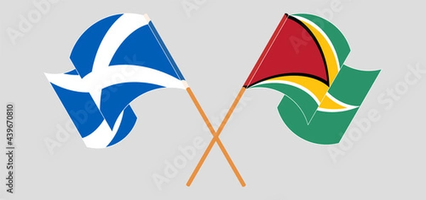 Fototapeta Crossed and waving flags of Scotland and Guyana