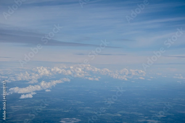 Fototapeta Aerial shot of a summer land with the clouds. 