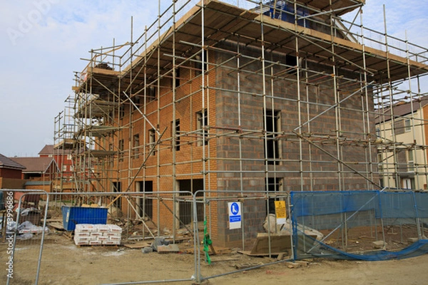 Fototapeta Construction of new houses with barrier