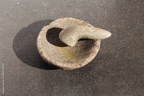 Fototapeta original stone mortar with a very unique and interesting texture. very good to use for cooking utensils products or ingredients for spices.