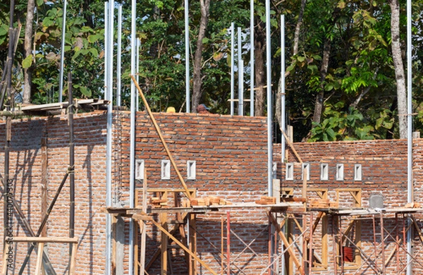 Fototapeta The house is under construction. materials for the preparation of fixed residential complexes with minimalist concepts and designs. very good for a real estate business.
