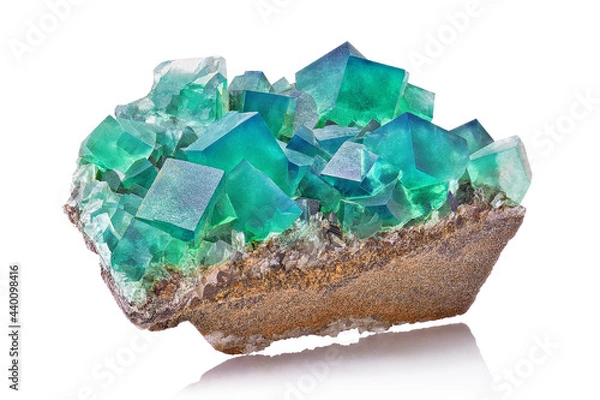 Fototapeta Amazing macro closeup of green blue rare fluorite mineral specimen isolated on white background. Rare double color mineral gem stone (fluorspar) from Rogerley in England. Natural cubic crystals