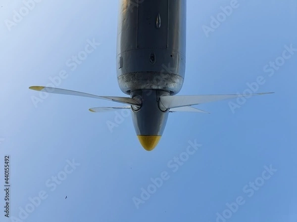 Obraz Airplane propeller against the blue sky. The aircraft engine is muted.