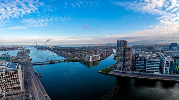 Fototapeta Dublin  Ireland - Aerial view of Dublin dockland district with the Capital Dock Residence block in the centre is a 22-storey  of Sir John Rogerson's Quay and Britain Quay