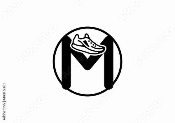 Fototapeta Black M initial letter with shoes in circle