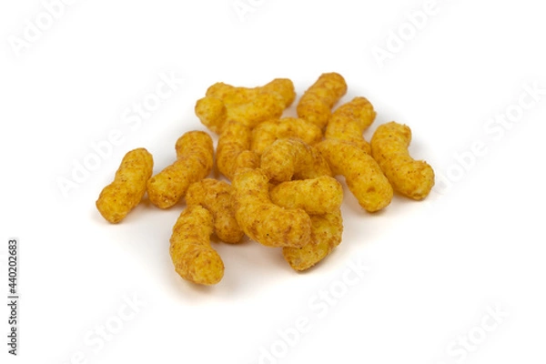Fototapeta Delicious unhealthy peanut flips on white background, copy space